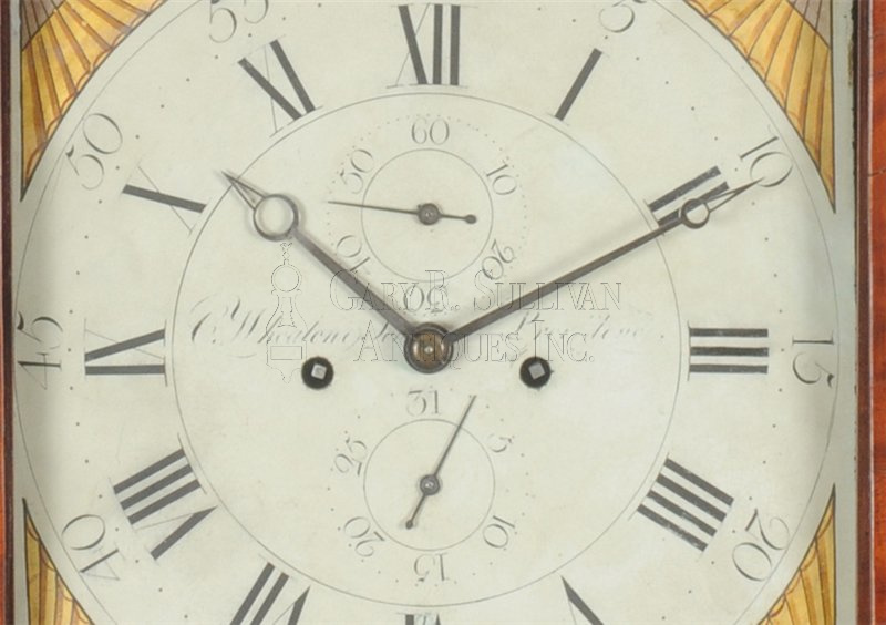 A fine Federal inlaid mahogany tall case clock by Caleb Wheaton & Son, Providence, Rhode Island, circa 1810.